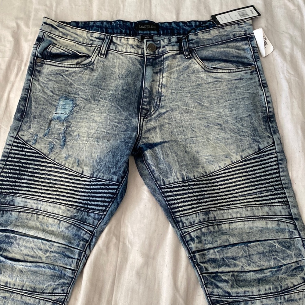 Acid washed blue jeans